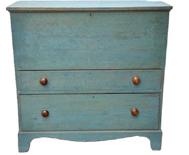 M118 18th century Massachusetts original blue painted chest over drawers resting on a tall, cut out bracket base. The lift lid features applied molding around the edges and opens to reveal a clean, natural patina interior. Both drawers have beaded edge fronts and are dovetailed construction. The drawer stretchers are also dovetailed. Three wide backboards are secured with �T� nails. Circa 1780s. Measurements: 43 &frac14;� wide x 18 &frac12;� deep x 43 &frac14;� tall.  