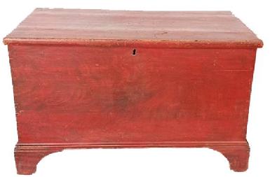 L534 Small sized 18th century New England original red painted pine blanket chest with dovetailed case and applied bracket base with nice cut out feet. Applied simple molded edges surround the lid. The clean, natural patina interior boasts a lidded till and original strap hinges. The wood is pine with dovetail, rosehead nails and �T� nail construction. Circa 1780s-1800. Measurements:  34 &frac34;� wide x 19 &frac12;� deep x 21 &frac14;� tall. 
