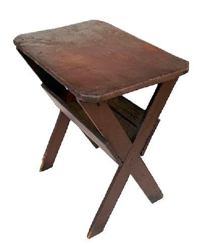 L264 Small sized, very early 19th century New England Sawbuck Table bearing a one-board pine top with clipped corners resting on crossed base with deep apple tray below. Original Spanish Red painted surface with a Museum mark visible on the edge of table�s top. Primarily square head nail construction � with one rosehead nail also found.  Circa 1820. Measurements are 26 &frac34;� wide x 18" deep x 29" tall.
