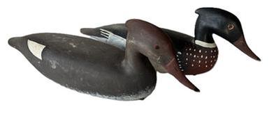 J225 Great pair of full sized Merganzer Decoys in original paint. Inset weight on bottom with paddle tails. Carver unknown. 