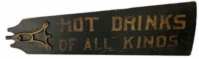 **SOLD** J42 Early 20th century double sided Restaurant Advertising Trade Sign painted on a wooden fan blade. One side reads �HOT DRINKS OF ALL KINDS� and the reverse side reads �PORK & BEANS�. Great hand-painted stenciled lettering on a black painted background. Original early metal fan bracket/hardware remains intact on one end and an early applied wooden batten remains intact on larger end. Tight cracks in wood. Circa 1900-1910.   Approximate measurements: 28 5/8� wide and tapers from 3� tall to 8 5/8� tall.