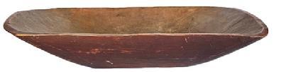 L391 Early 19th century oval Trencher bearing gorgeous original red painted exterior and a wonderful natural patina interior with evidence of significant chop and tool marks from years of use. Circa 1830�s � 1840�s. Hand hewn from a single board � with visible carve markings on both the interior and exterior surfaces. Great wear and patina. Age crack to one end that is tight and does not affect integrity of the trencher. Measurements: 21 &frac14;� long x 11 &frac12;� wide x 4�-4 &frac12;� deep (depending on where measured). 