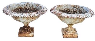 **SOLD** K179 Late 19th century  Matching pair of ornate Cast Iron Garden Urns retaining old white painted surfaces. Urns are solid cast iron with leaf patterned rims resting on square bases. Measurements:  21� across tops (openings are 15 &frac12;� diameter) x 7 &frac14;� square bases x 13 &frac12;� tall