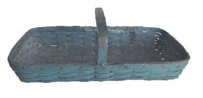 M297 19th century Pennsylvania hand woven splint Gathering Basket in original blue painted surface. Very sturdy basket with shallow sides and a double steamed and bent rimmed opening with a 1 1/8� wide steamed and bent handle secured with tiny tacks and a tin �T� bracket on each side of the handle-basket junction for added support. The slats used for the bottom are 1 &frac12;�-1 &frac34;� wide. Very minor losses � commensurate with age and use. Measurements: 25 &frac12;� x 13 &frac12;� x  3 &frac12;�-4� tall sides, depending on where measured. ~8� tall at handle. 