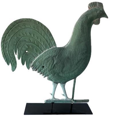 L38 Spectacular oversized American late 19th century hollow bodied Copper Rooster Weathervane with zinc legs and verdigris surface. Full body style with a realistically shaped high tail bearing feather impressions. Tight solder seams throughout. Custom heavy metal stand included for display purposes. Measurements: 25� wide x ~28 &frac12;� tall (30 &frac12;� tall on stand). Base measures 20� long x 5� wide.     