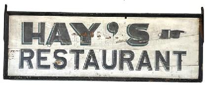 J446 Fantastic double sided wooden trade sign advertising �Hay�s Restaurant� with a painted hand pointing the direction. The lettering and directional on each side is hand painted in original black paint with green highlighting / shadowing on a white background