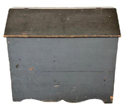 M56 Exceptional 19th century Pennsylvania Bin with divided interior in its original blue painted surface with cut out ends and decorative cut out drop apron. Battens inside the lid have kept the lid from twisting / warping over the years.  The wood is pine with square head nail construction. Circa 1850s. Measurements: 45� wide x 19 &frac14;� deep x 39 &frac12;� x tall (back). 