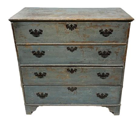 M255 18th century William and Mary Chest over drawers with snipe hinged lid in original dry blue paint. American, Circa 1720 chest with two false drawers over two dovetailed drawers with mortised stretchers. One board construction. Applied molding to the lid with till inside. Two board back secured with rose head nails. The wood is white pine. Measurements: 37 &frac14;� wide x 18 &frac14;� deep x 38� tall.