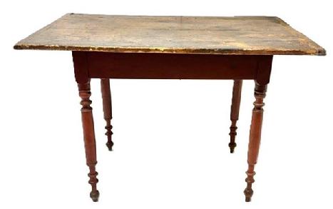 M206 Late 18th century Pennsylvania Sheraton red painted two board top pine Worktable resting on nicely turned legs. Rosehead nails. The apron is fully mortised and pegged into the legs. Measurements: 42 &frac34;� wide x 29� deep x 29� tall. Overhang on the ends is 6 &frac34;� and 6 7/8�, whereas the overhang on the sides is 4� on each side. Apron to floor measures 23�.  