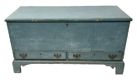**SOLD** M315 Stunning 18th century identified Pennsylvania Chippendale blanket chest retaining old blue over original blue painted surface with a dovetailed case and two dovetailed drawers resting on a high applied bracket base with dovetailed feet. Lid has breadboard ends and molded edge. The wood is pine, six board dovetail construction. Clean, natural patina interior boasts a lidded till with beaded edge and a hidden drawer below. The back of the drawer is signed �William Pearson I am� on one side and the name �Charles Sopris� is etched in the opposite side. Circa 1780s. Measurements: 49� wide x 19 &frac34;� deep x 26 &frac12;� tall. 