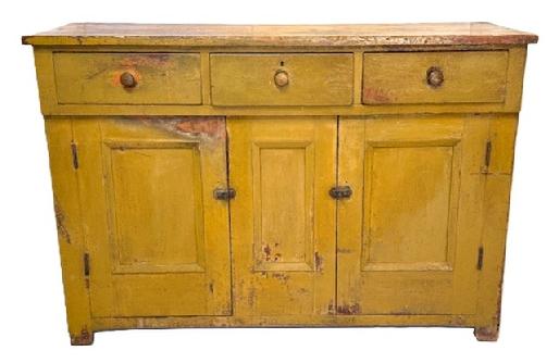 M90 Large Pennsylvania server with three dovetailed drawers over two mortised doors retaining old mustard over original red painted surface. The molded edged panel doors match the stationary center panel and both sides/ends. The wood is white pine with square head nail construction. Clean, natural patina interior. Circa 1840�s. Measurements: 61 &frac34;� wide x 21 &frac34;� deep x 42� tall. The top board is a full 1� thick.  