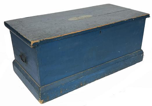 **SOLD** ____ Sturdy 19th century Maine Sea Chest in vibrant blue paint over the original blue paint. Dovetailed case with applied molded base. Clean, natural patina interior with lidded till and recessed storage area below till � that may have held a drawer at some point. Battens attached to the underside ends of the lid with early screws have kept the lid from twisting and/or warping over the years. Circa 1850s. Measurements: 34 &frac14;� wide x 17 &frac14;� deep x 14 &frac12;� tall. 