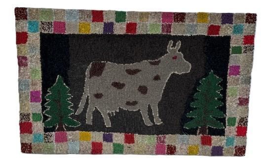 F127 19th century beautiful hand hooked rug depicting a folky cow standing between two evergreen trees on a black background. The rug�s 4� border consists of a double-row checkerboard of many colors. Constructed of several types of fibers hooked into burlap. It has been professionally cleaned and mounted on frame that is ready for hanging. Measurements are 41" wide x 22" tall. 