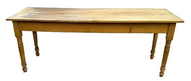 ET2 (G340) Nice, sturdy late 19th century Lancaster County, Pennsylvania original mustard grain painted Harvest Table. The apron is mortised and pegged into the turned legs. Great wear. Circa 1860s-1880s. Measurements: 80 &frac14;� long x 29 &frac12;� wide x 30 &frac14;� tall. Apron to floor clearance is 23 &frac34;� tall.   