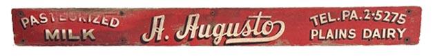 **SOLD** M314 Early 20th century long wooden Pennsylvania Trade Sign � Advertising "Pasteurized Milk  A. Augusto  Tel. PA.2.5275 Plains Dairy". Single sided, featuring original hand-painted lettering done in white with black shadowing on a red painted background. The back of the sign also bears its original red painted surface. Measurements: 88� wide x 8 &frac14;� tall x 1� thick.  