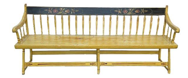 **SOLD** M79 Pennsylvania paint decorated arrow back plank-seat Deacon's Bench/Settee of the mid-19th century (1845-65) bearing its original mustard painted surface with a black painted top rail decorated with floral motifs in greens, reds and gold paint. Gold pin striping throughout.  Measurements: 76� wide x 18� deep x 30 &frac12;� tall. The seat is 15� tall. 