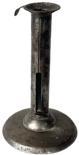 J309 Signed Hog scraper push-up candlestick bearing original natural surface. Finger curl for holding remains intact on top rim. Stamped on the original, working push-up tab by maker (unreadable). �Christies� auction stickers remain intact on bottom. Original worn, slightly pitted surface bears great patina indicative of age. Measurements: 3 7/8� diameter (base) x 6 &frac12;� tall. 